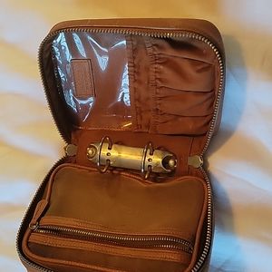 Trish McEvoy  makeup bag brown